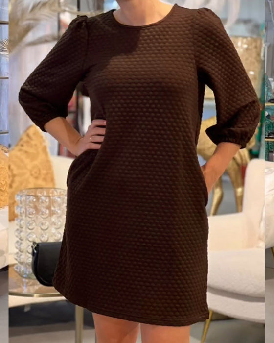 Elegancka sukienka w jednolitym kolorze