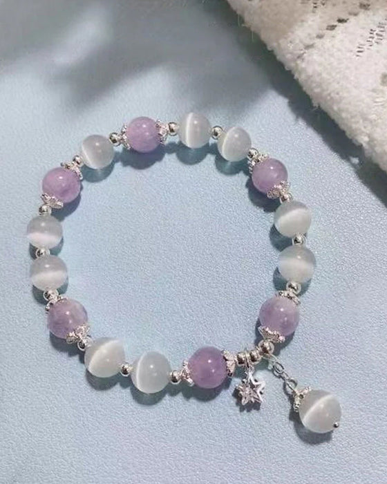 Bransoletka z kryształami imitującymi oko kota w kształcie motyla