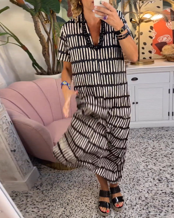 Długa sukienka z nadrukiem z krótkim rękawem