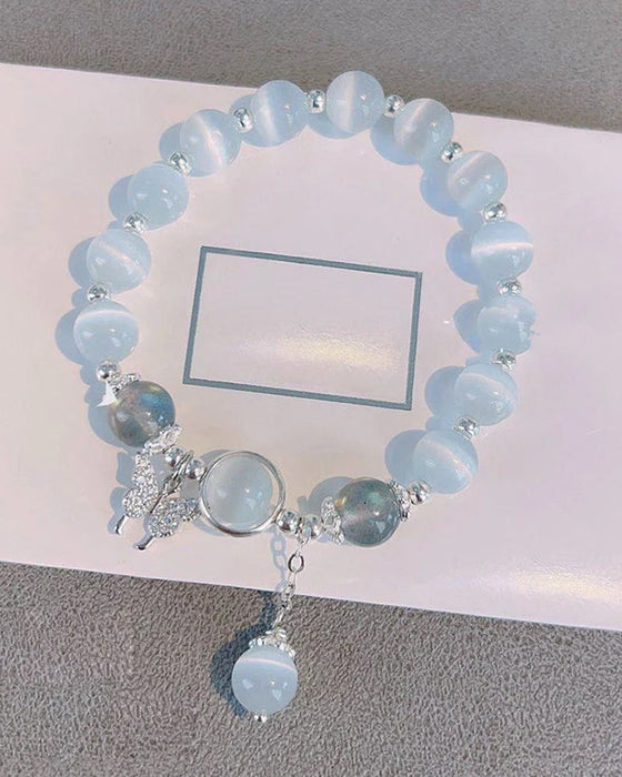 Bransoletka z kryształami imitującymi oko kota w kształcie motyla