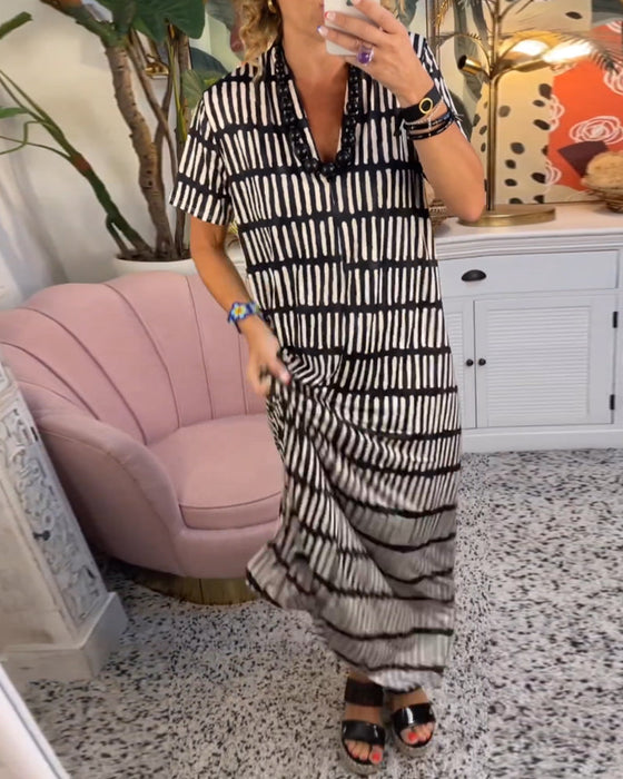 Długa sukienka z nadrukiem z krótkim rękawem