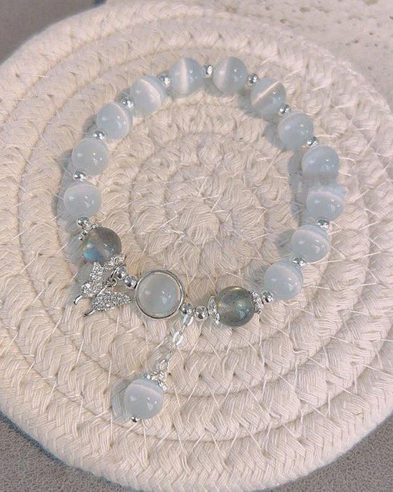 Bransoletka z kryształami imitującymi oko kota w kształcie motyla