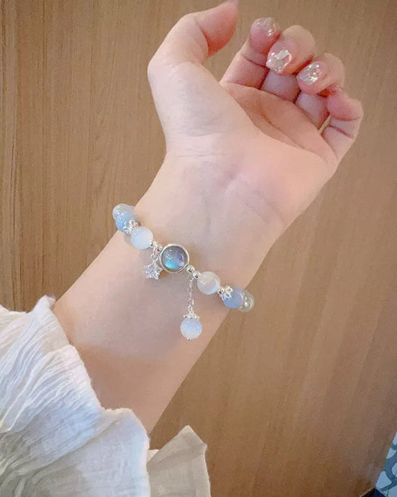 Bransoletka z kryształami imitującymi oko kota w kształcie motyla