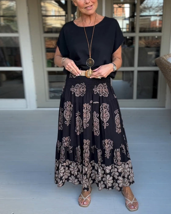 Spódnica z kwiatowymi panelami i zakładkami