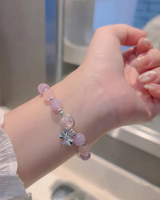 Bransoletka z kryształami imitującymi oko kota w kształcie motyla