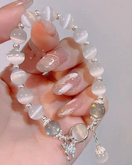 Bransoletka z kryształami imitującymi oko kota w kształcie motyla