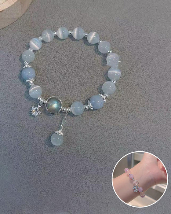 Bransoletka z kryształami imitującymi oko kota w kształcie motyla