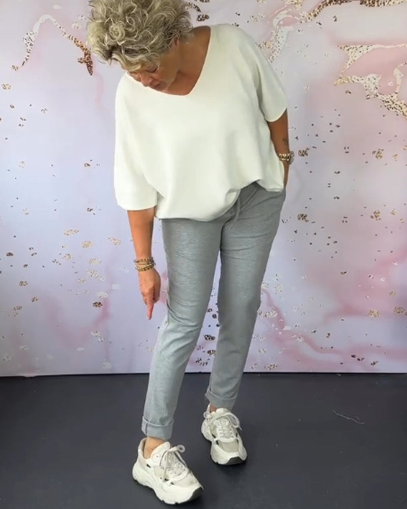 Spodnie casualowe w jednolitym kolorze z kieszeniami i ściągaczem