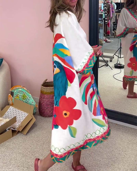 Sukienka z nadrukiem graffiti z dekoltem w szpic