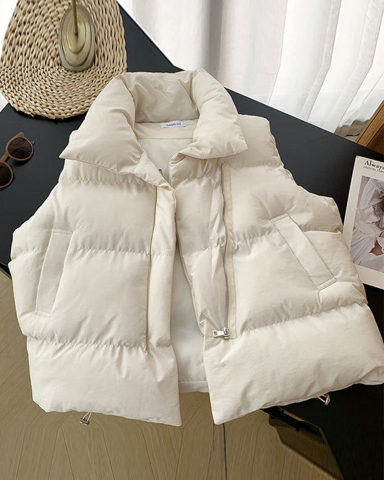 Prosta jednokolorowa pikowana kurtka z kieszenią zapinaną na zamek