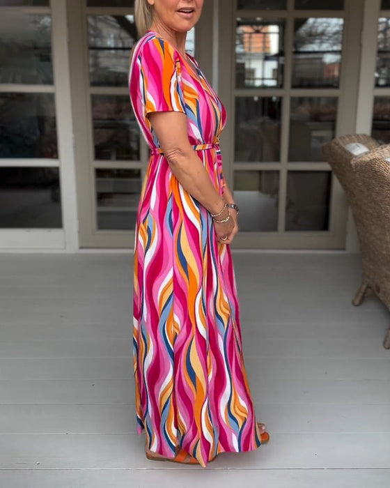 Długa sznurowana sukienka z kolorowym nadrukiem i krótkim rękawem