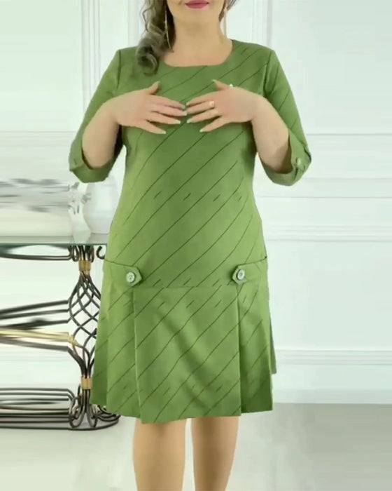 Elegancka sukienka z okrągłym dekoltem i nadrukiem