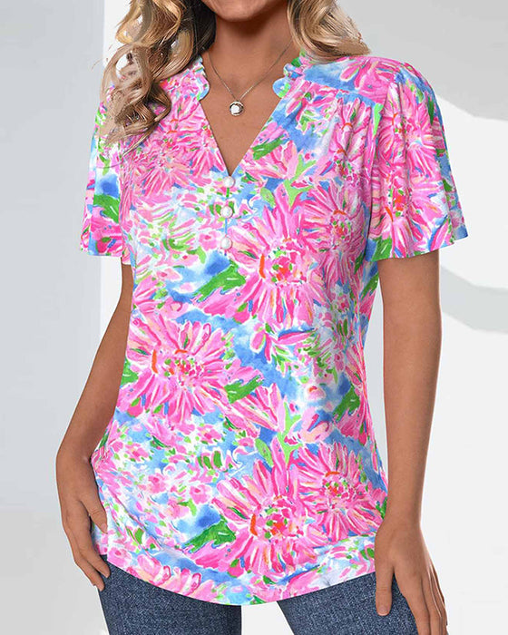 Bluzka z krótkim rękawkiem w kwiaty i guziki