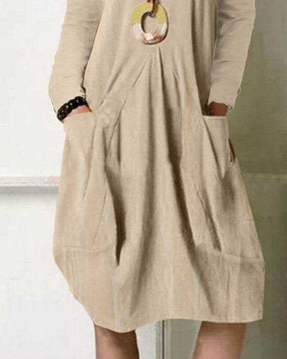 Sukienka z kieszeniami w jednolitym kolorze