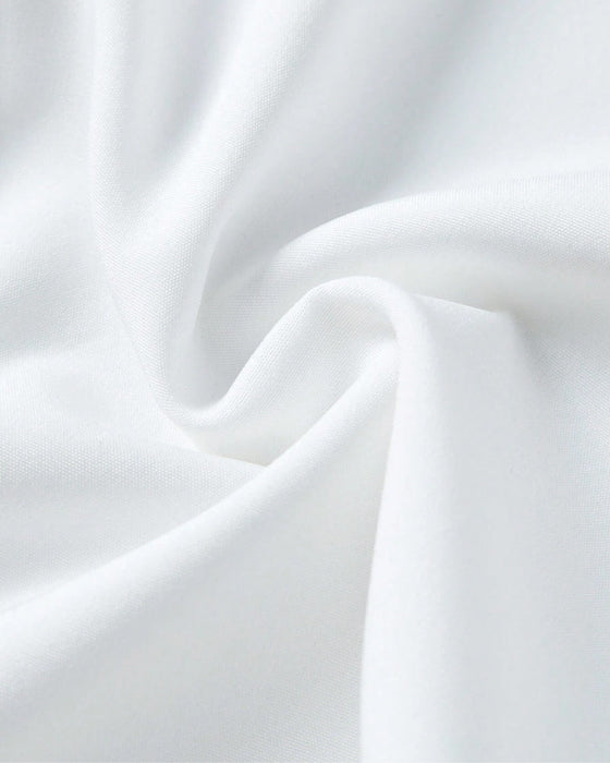 Koszula w jednolitym kolorze z falbaną i guzikami