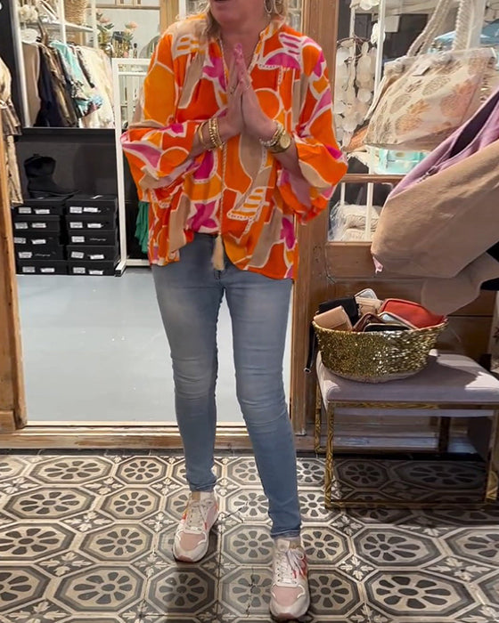 Bluzka kolorowa z szerokim ramieniem