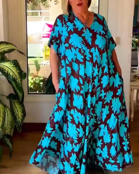 Luźna sukienka z kwiatowym nadrukiem i dekoltem w kształcie litery V