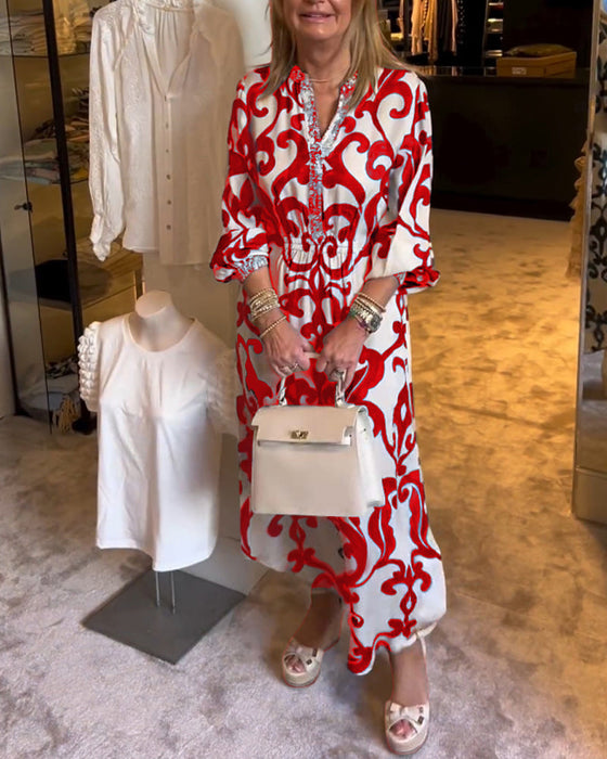 Luźna sukienka z nadrukiem i dekoltem w szpic