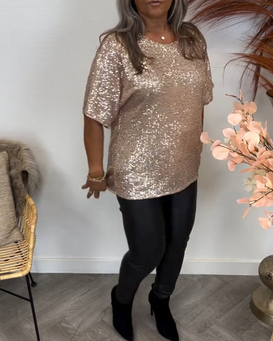 Elegancka bluzka z cekinami i okrągłym dekoltem