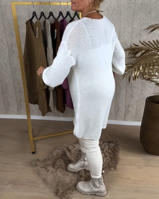 Sweter o nieregularnym kroju w jednolitym kolorze