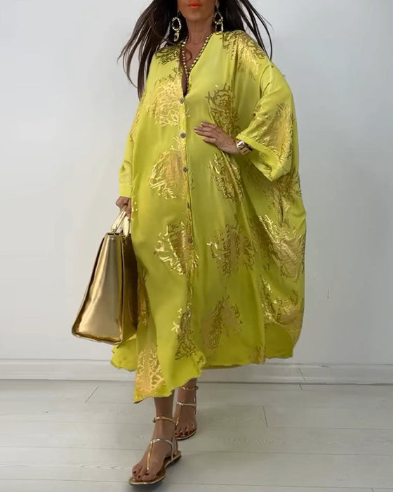 Sukienka z długim rękawem zapinana na guziki