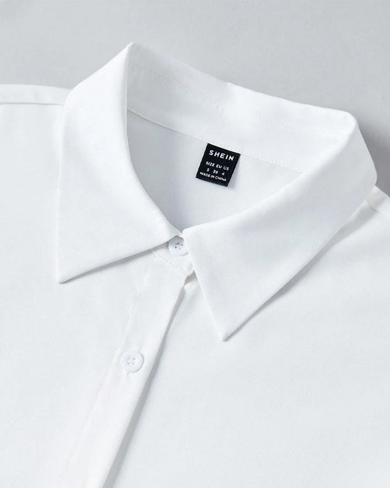 Koszula w jednolitym kolorze z falbaną i guzikami