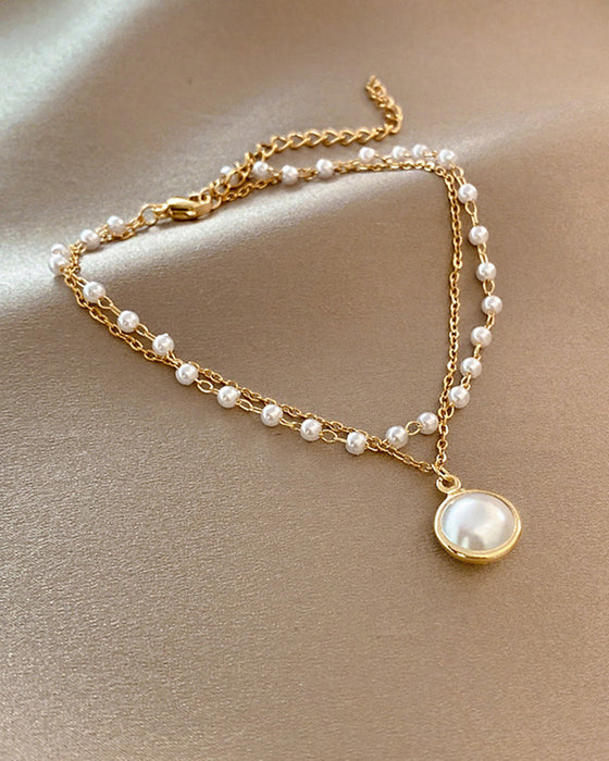 Bransoletka z perłami na metalowym łańcuszku