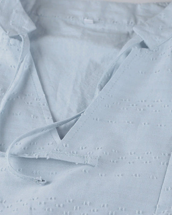 Wakacyjna sukienka w jednolitym kolorze z kieszeniami