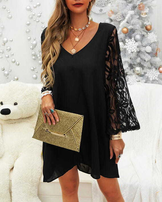 Elegancka czarna sukienka z koronkowymi rękawami