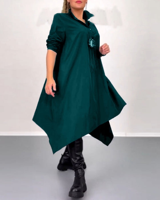 Sukienka o nieregularnym kroju w jednolitym kolorze