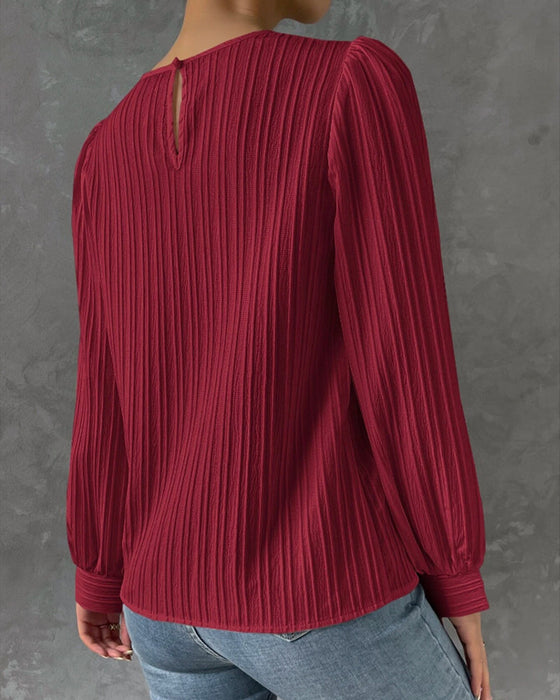 Solidna bluzka z rękawami latarniowymi