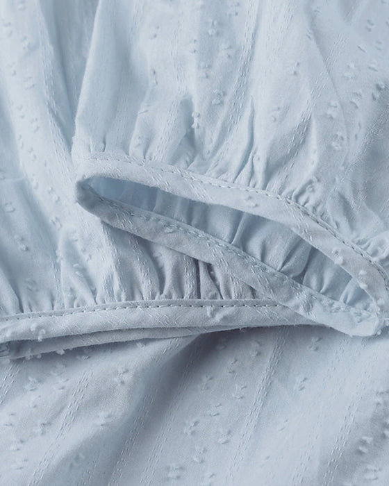 Wakacyjna sukienka w jednolitym kolorze z kieszeniami