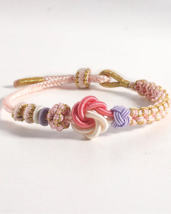 Bransoletka z kwiatami brzoskwini