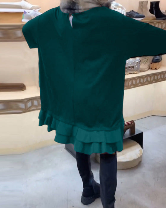 Sukienka o eleganckiej sylwetce i długim rękawie