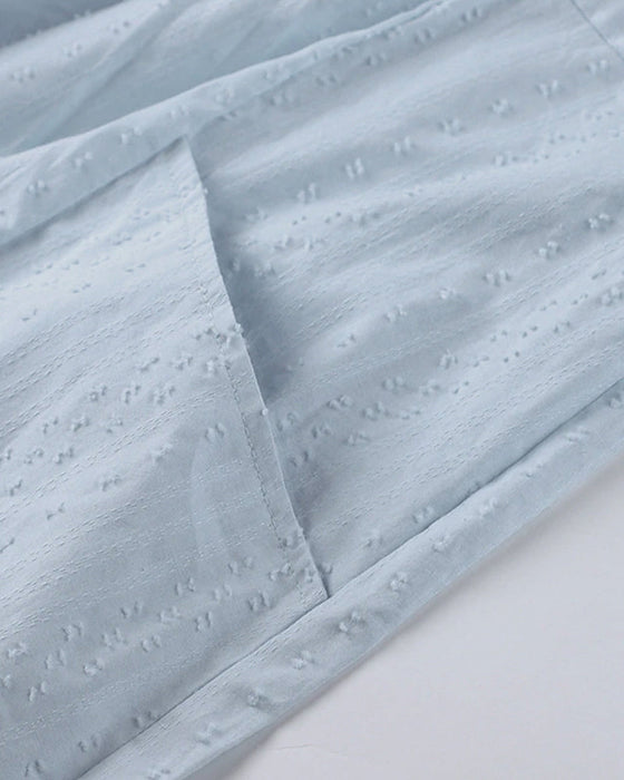 Wakacyjna sukienka w jednolitym kolorze z kieszeniami