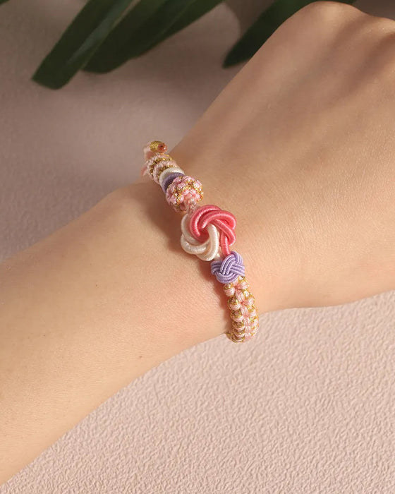 Bransoletka z kwiatami brzoskwini