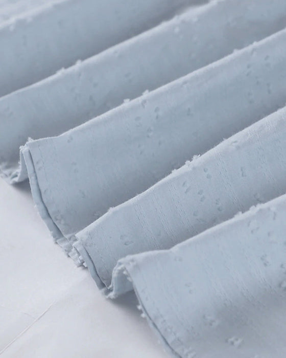 Wakacyjna sukienka w jednolitym kolorze z kieszeniami