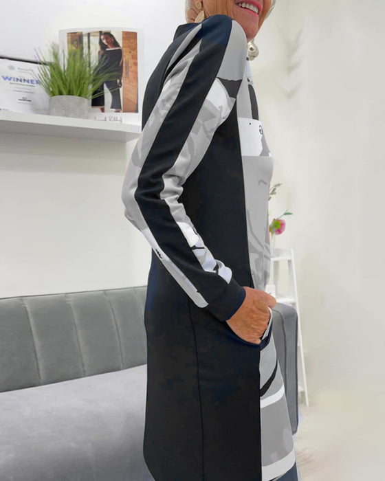 Sukienka z długim rękawem i kieszenią zapinana na suwak w bloki kolorów