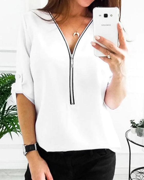 Solidna bluzka zapinana na zamek