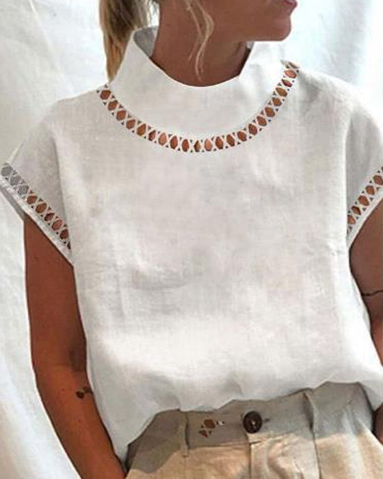 Bluzka ze stójką z koronki w jednolitym kolorze