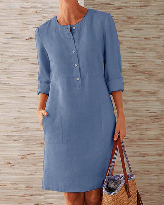 Jednolita sukienka do kolan z okrągłym dekoltem