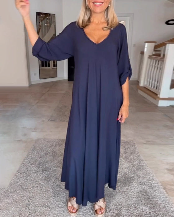 Sukienka w jednolitym kolorze z dekoltem w szpic