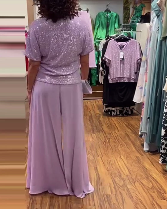 Luźna cekinowa bluzka z krótkim rękawem i dekoltem w kształcie litery V