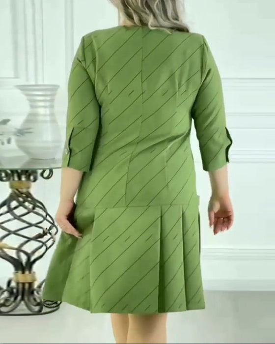 Elegancka sukienka z okrągłym dekoltem i nadrukiem