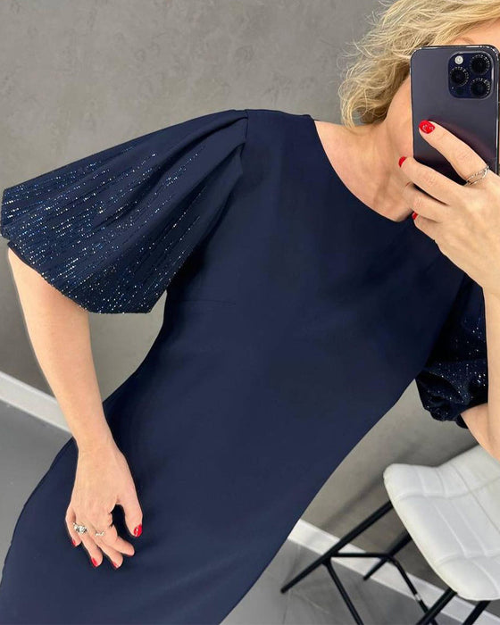 Elegancka sukienka z bufiastym rękawem i krótkim rękawkiem