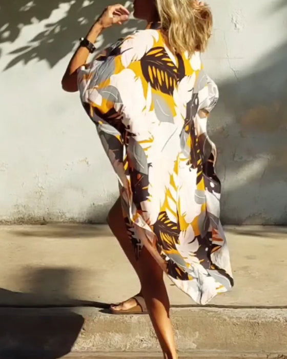 Sukienka z kieszeniami i nadrukiem liści