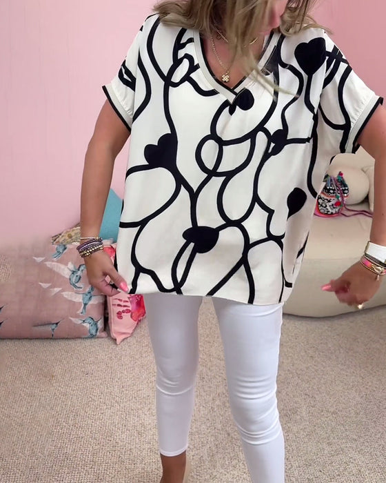 Bluzka z krótkim rękawem i dekoltem w kształcie litery V w kontrastowym kolorze