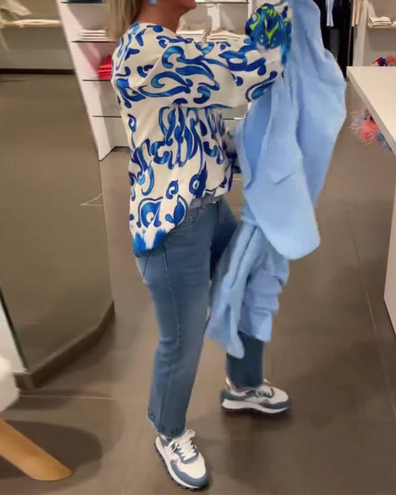 Elegancka bluzka z długim rękawem i dekoltem w kształcie litery V