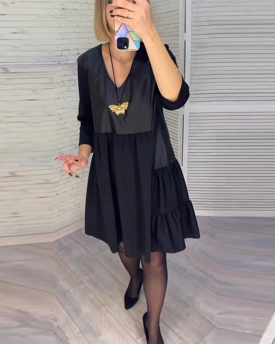 Patchworkowa sukienka z dekoltem w kształcie litery V