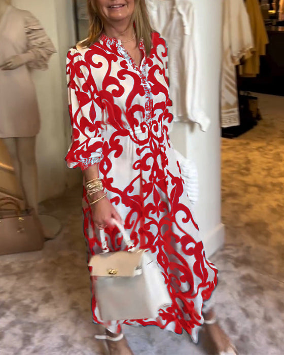 Luźna sukienka z nadrukiem i dekoltem w szpic